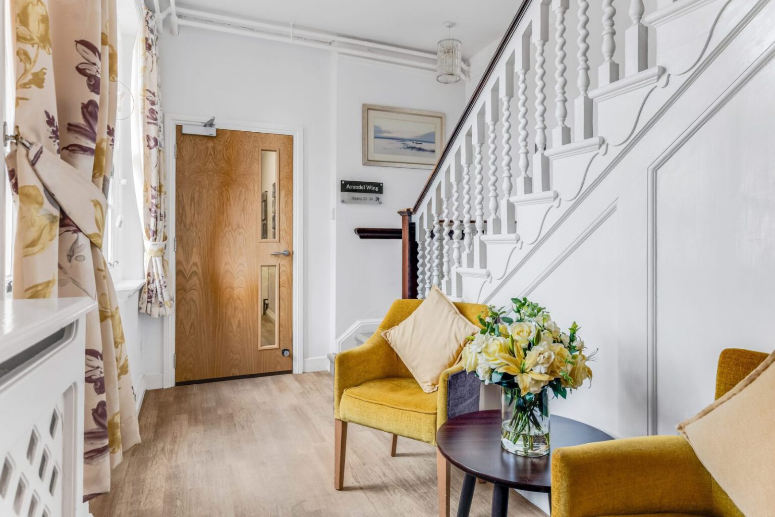 A seating area in the hallway at Downs House