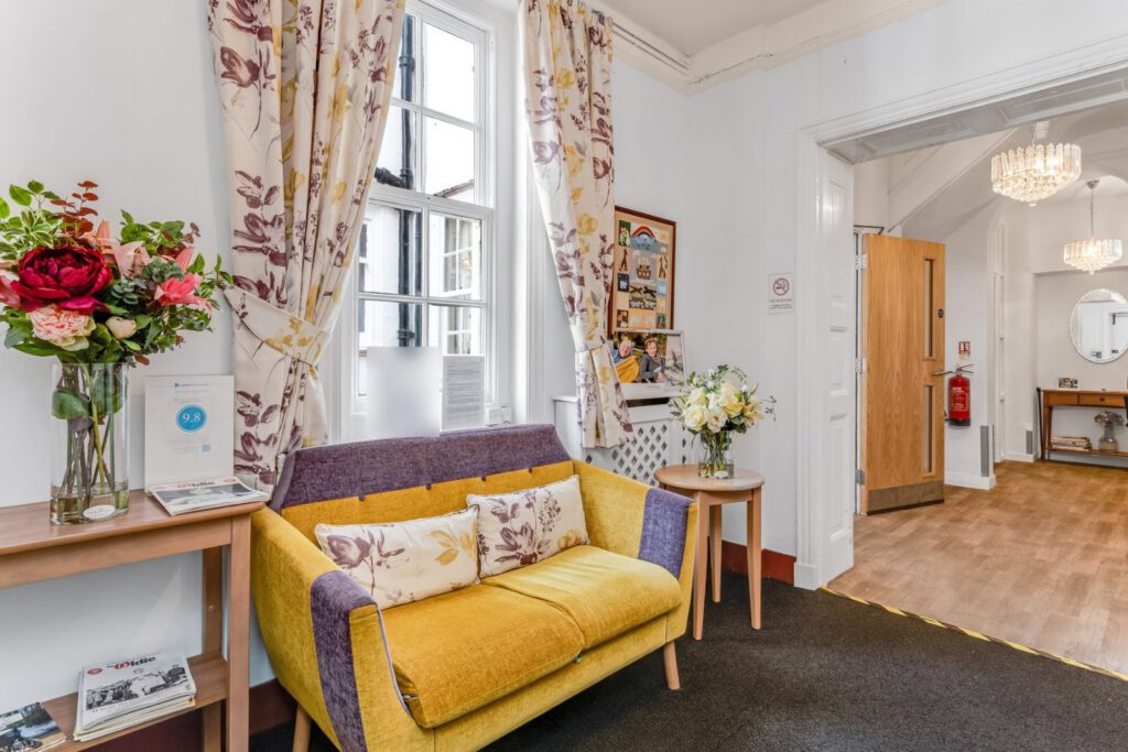 The bright reception lounge at Downs House
